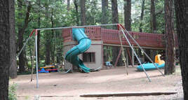 Northwoods Cabins Pinetop Arizona Resort  has  a Playground for the Kiddos
